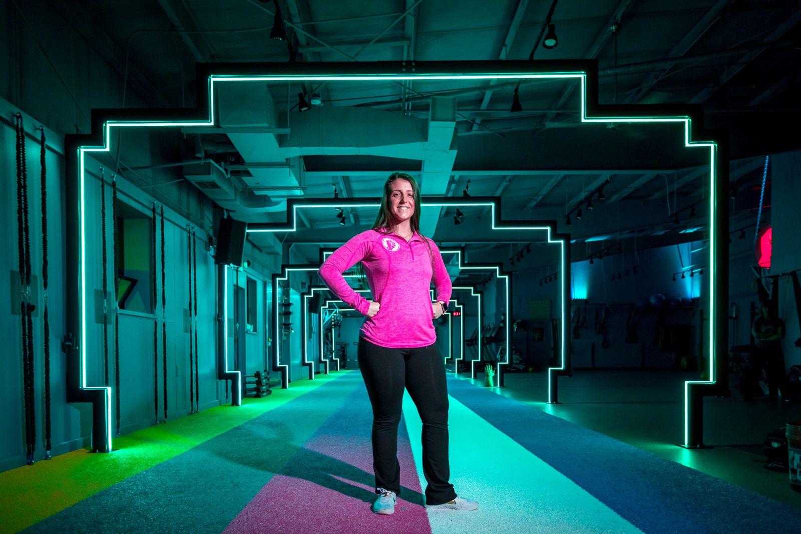 A Stronger team member in the illuminated studio.